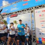 Atletas na largada da Corrida Paraibana pelo Autismo em João Pessoa